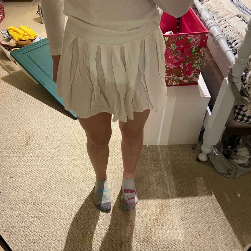 White flowy mini skirt